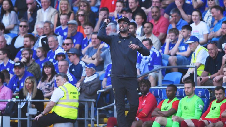 Jurgen Klopp gestures on the sideline during Liverpool's win at Cardiff.