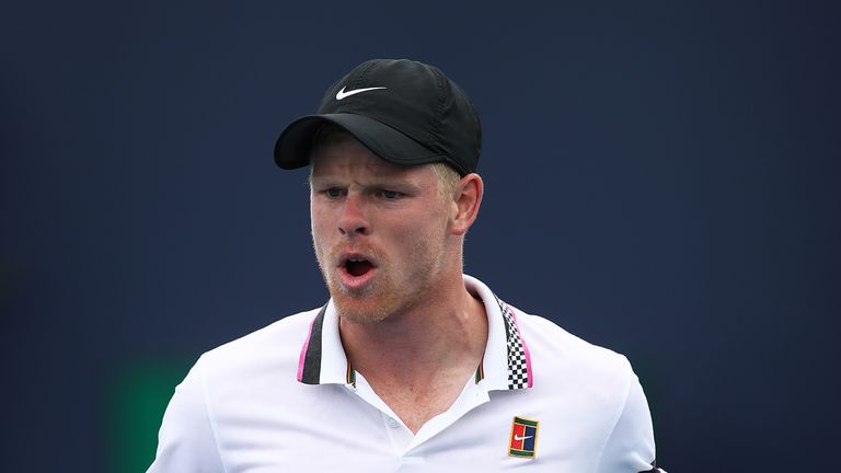 Kyle Edmund of Great Britain celebrates winning a game against Milos Raonic of Canada during day seven at the Miami Open Tennis on March 24, 2019 in Miami Gardens, Florida