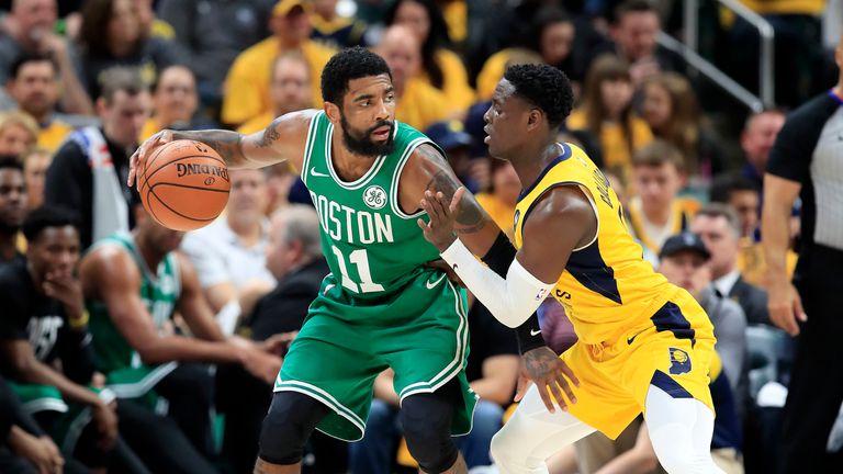 Kyrie Irving of the Boston Celtics dribbles the ball against the Indiana Pacers in game four of the first round of the 2019 NBA Playoffs