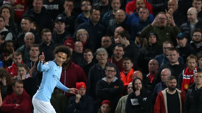 Leroy Sane gestures to his team-mates after doubling Manchester City's lead