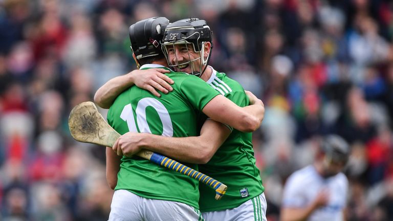 Diarmaid Byrnes and Gearóid Hegarty celebrate at full-time