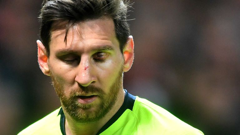 Lionel Messi was left bloodied and bruised by Chris Smalling