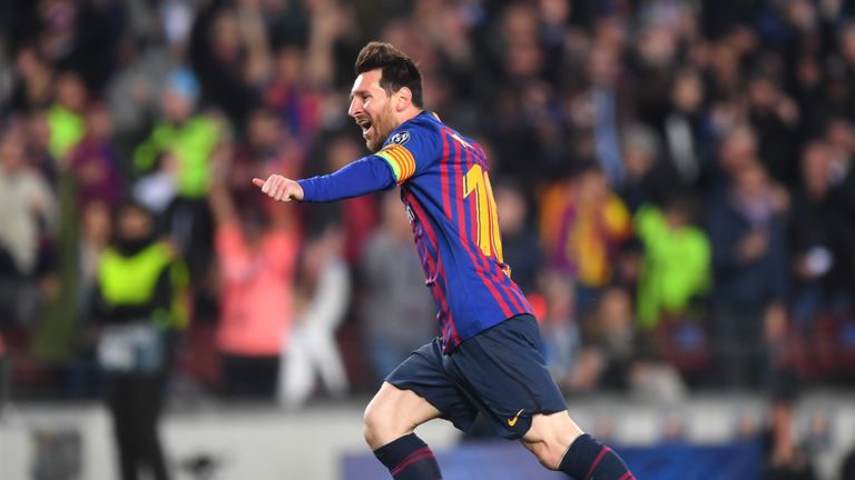 Lionel Messi celebrates scoring his second goal against Manchester United