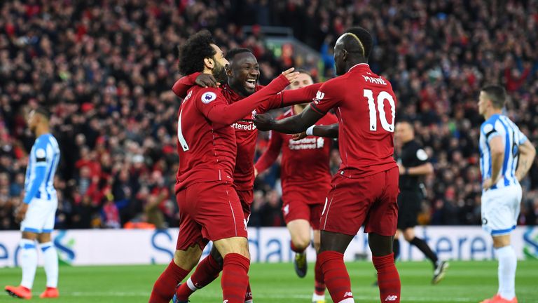 Liverpool celebrate a goal against Huddersfield