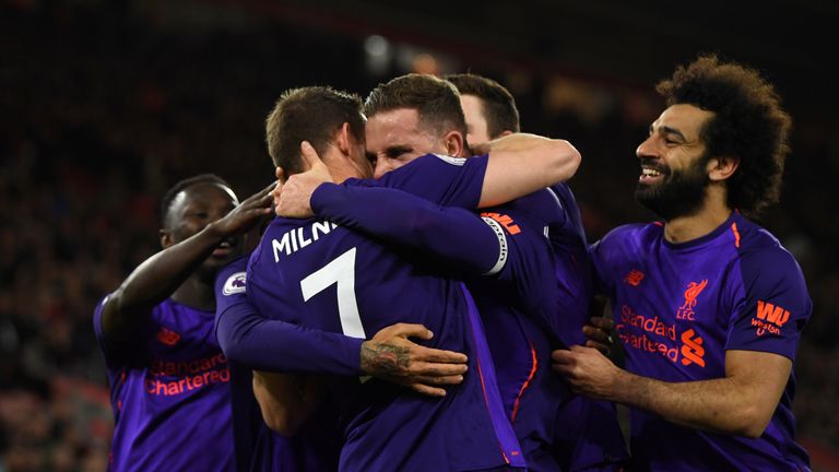 Liverpool players celebrate their win at Southampton