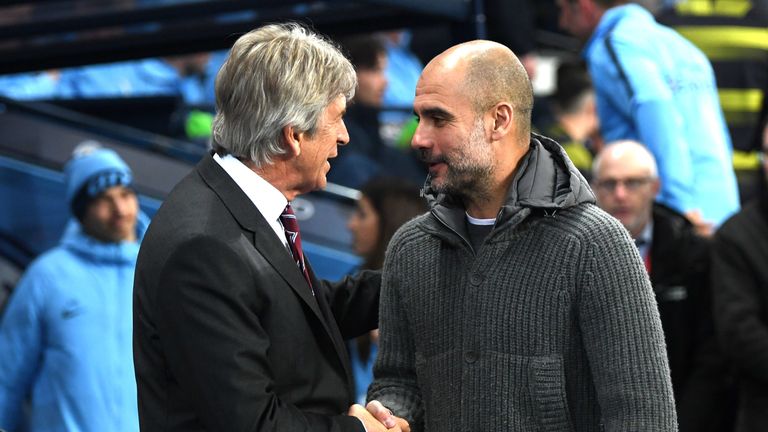 Manuel Pellegrini, Manager of West Ham United shakes hands with Josep Guardiola, Manager of Manchester City prior to the Premier League match between Manchester City and West Ham United at Etihad Stadium on February 27, 2019 in Manchester, United Kingdom.