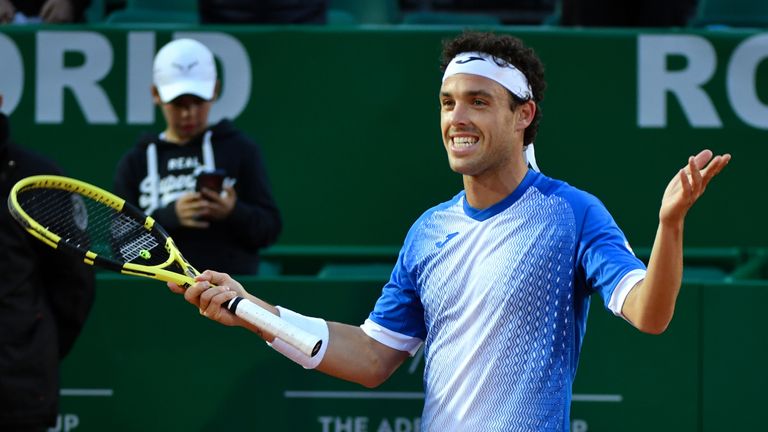 Italy's Marco Cecchinato celebrates after winning his tennis match against Switzerland's Stan Wawrinka on the day 4 of the Monte-Carlo ATP Masters Series tournament on April 16, 2019 in Monaco