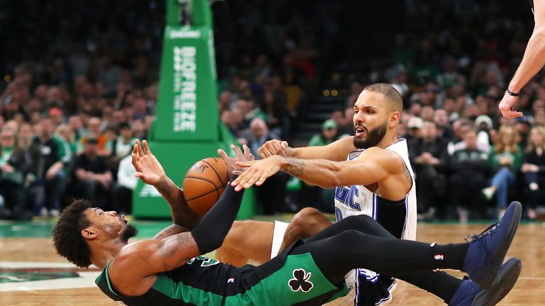 Marcus Smart is helped off the court after apparent injury