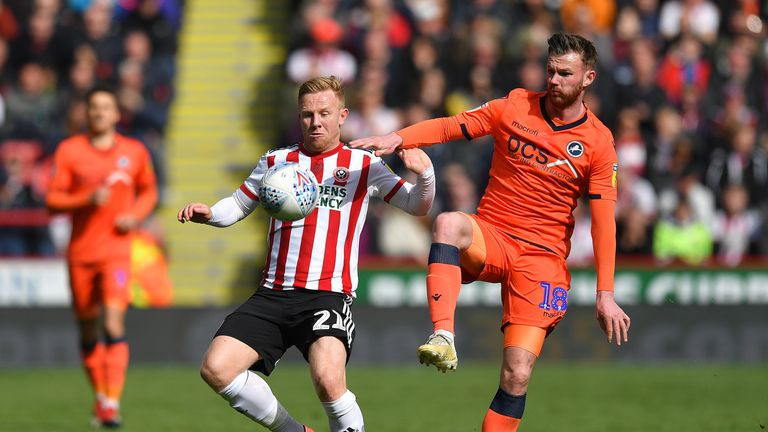 Sheffield United's Mark Duffy battles with Millwall's Ryan Tunnicliffe