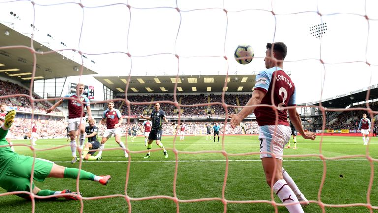 Matt Lowton's control took the ball barely three centimetres over the line from Sergio Aguero's shot