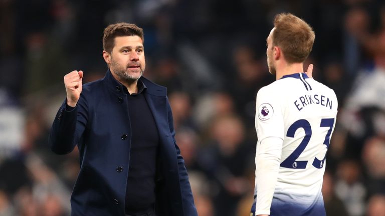 Mauricio Pochettino celebrates with Christian Eriksen after the 2-0 win over Crystal Palace