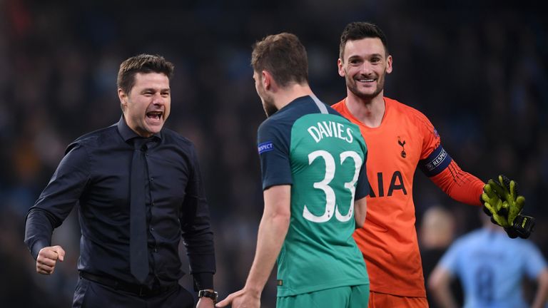 Mauricio Pochettino celebrates with Ben Davies and Hugo Lloris after Spurs beat Manchester City to reach the Champions League