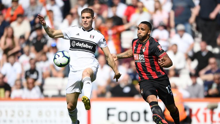 Maxime Le Marchand battles for possession with Callum Wilson