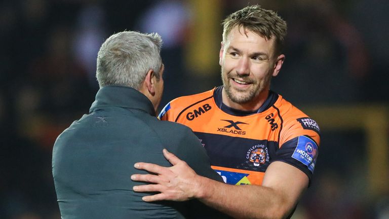 Shenton celebrates the win over Wigan with head coach Daryl Powell