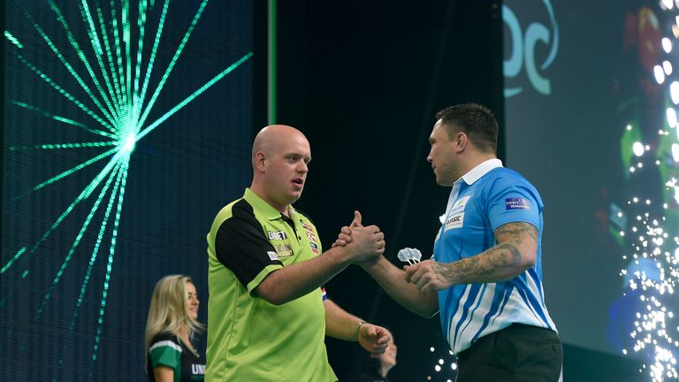 Michael van Gerwen and Gerwyn Price during the Unibet Premier League Darts at the SSE Arena, Belfast. Picture: Michael Cooper