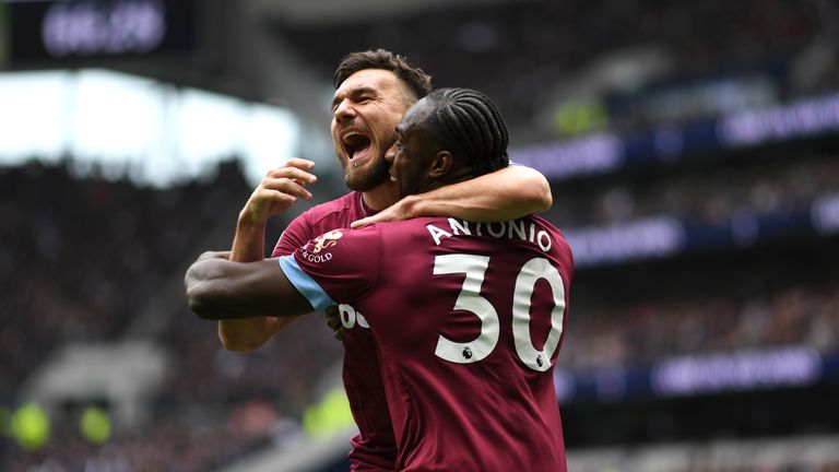 Michail Antonio celebrates with Robert Snodgrass after giving West Ham the lead