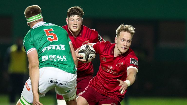 Mike Haley of Munster takes on Federico Ruzza of Benetton Treviso 