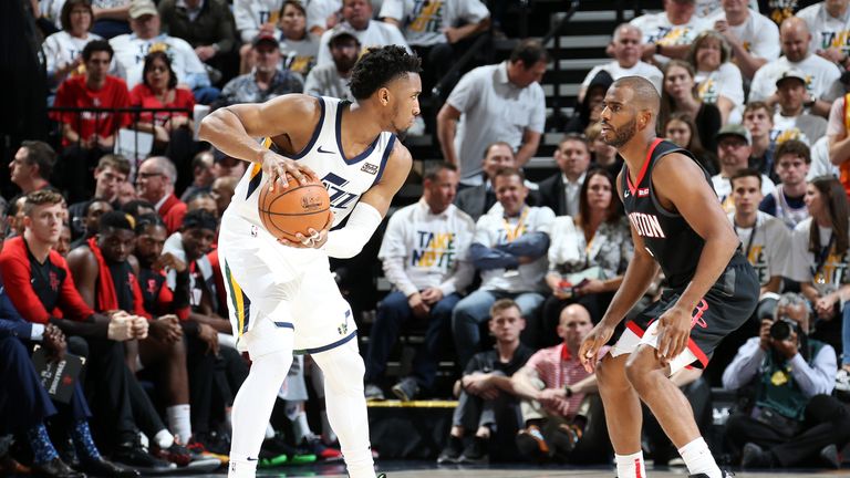 Donovan Mitchell of the Utah Jazz handles the ball against Chris Paul of the Houston Rockets during Game Four of Round One of the 2019 NBA Playoffs