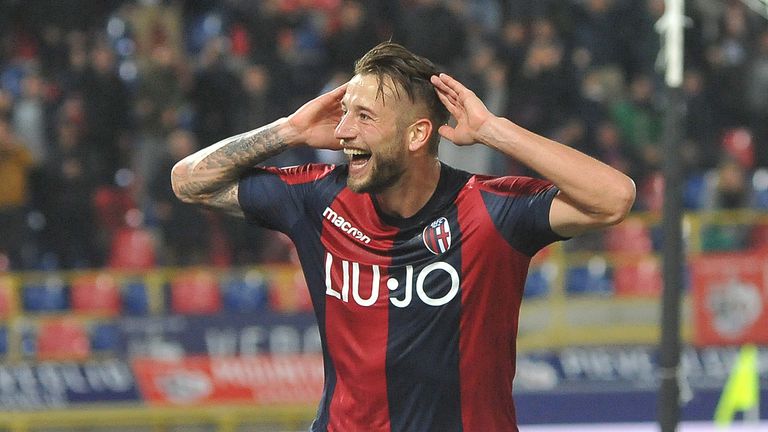 Mitchell Dijks of Bologna celebrates after scoring his team's third goal against Chievo