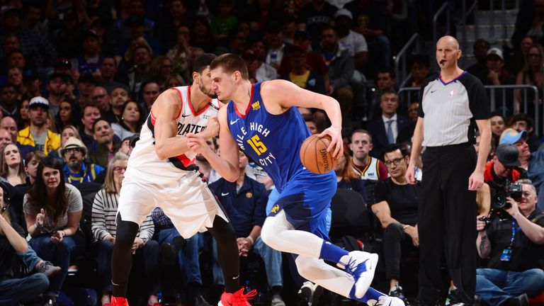 Nikola Jokic #15 of the Denver Nuggets handles the ball against the Portland Trail Blazers on April 5, 2019 at the Pepsi Center in Denver, Colorado