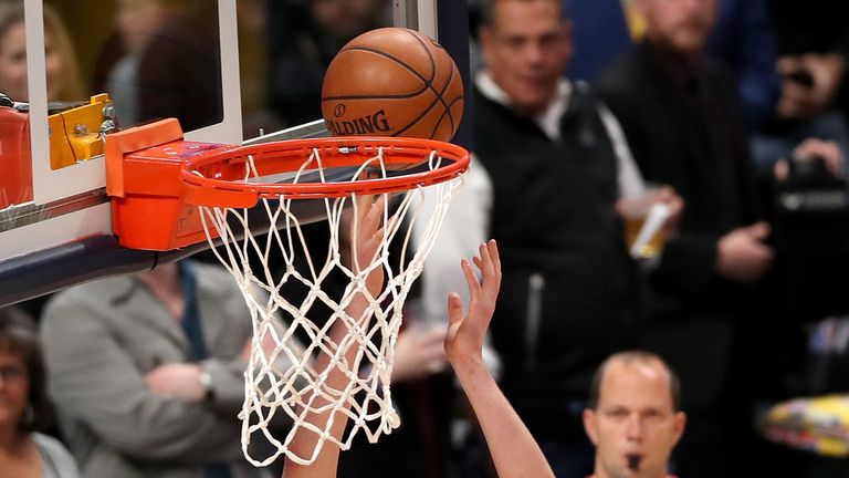 Nikola Jokic #15 of the Denver Nuggets takes the ball to the basket against the San Antonio Spurs in the first quarter during Game Seven of the first round of the 2019 NBA Western Conference Playoffs at the Pepsi Center on April 27, 2019 in Denver, Colorado.