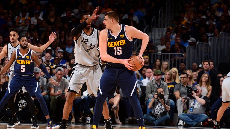 Nikola Jokic #15 of the Denver Nuggets handles the ball against the San Antonio Spurs during Game Seven of Round One of the 2019 NBA Playoffs on April 27, 2019 at the Pepsi Center in Denver, Colorado. N