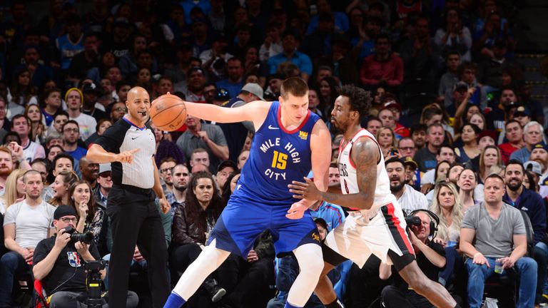 Nikola Jokic of the Denver Nuggets handles the ball against the Portland Trail Blazers