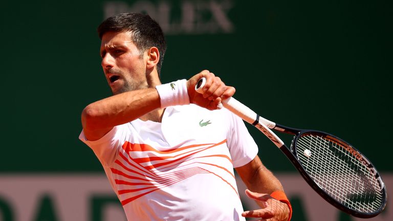 Novak Djokovic in action against Daniil Medvedev