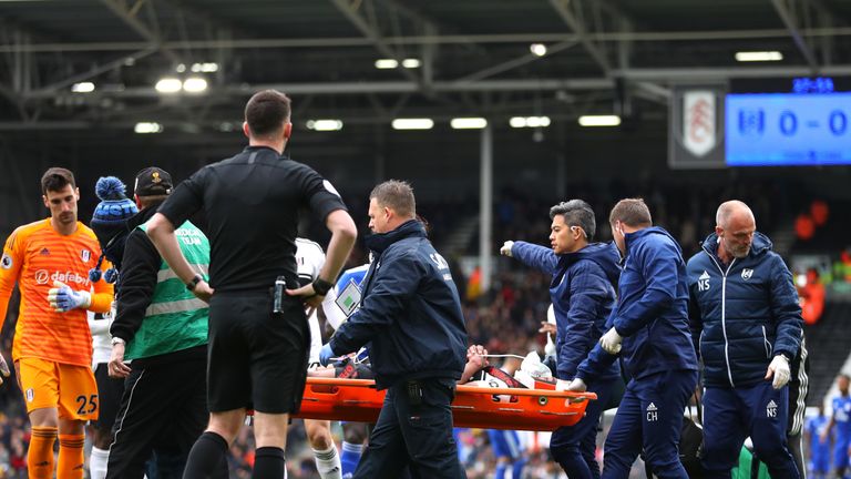 An injured Denis Odoi of Fulham is stretchered off during the Premier League match between Fulham FC and Cardiff City at Craven Cottage on April 27, 2019 in London, United Kingdom.