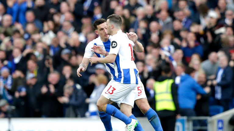 Pascal Gross celebrates his equaliser with Lewis Dunk