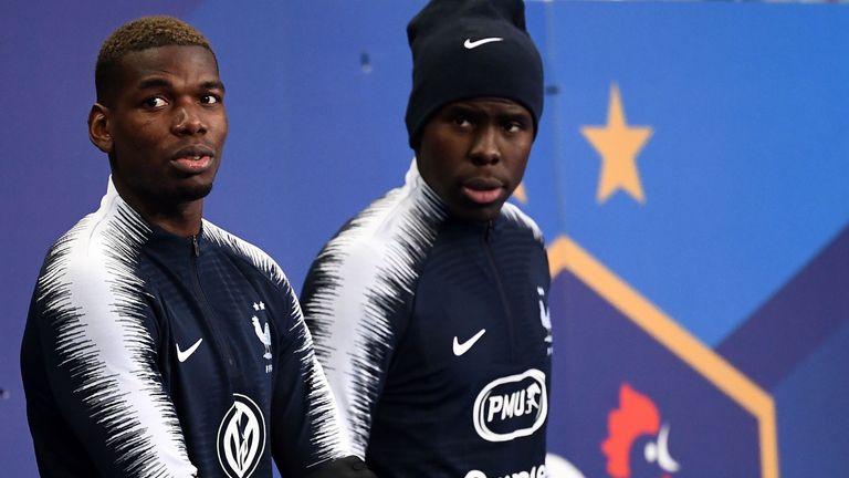 Kurt Zouma (L) was named in the France squad alongside Paul Pogba (R) in March. 