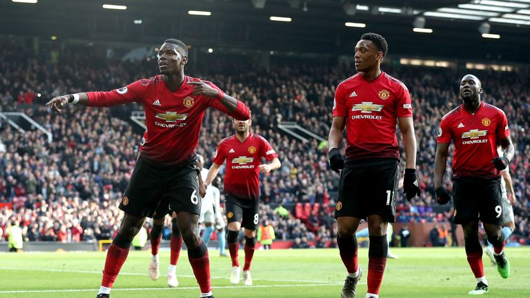 Paul Pogba celebrates after scoring the opening goal of the game