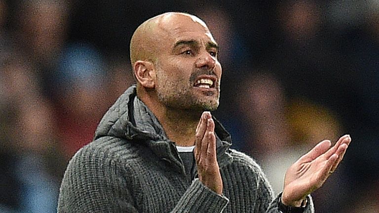 Manchester City&#39;s Spanish manager Pep Guardiola shouts instructions to his players from the touchline during the English Premier League football match between Manchester City and Cardiff City at the Etihad Stadium in Manchester, north west England, on April 3, 2019.
