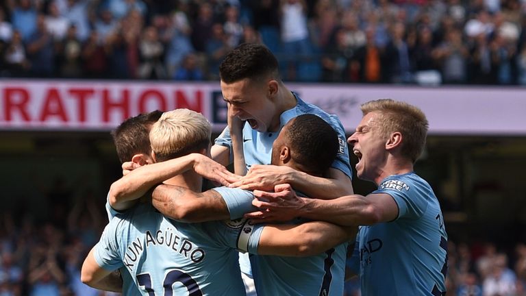 Phil Foden celebrates with team-mates after putting Man City ahead