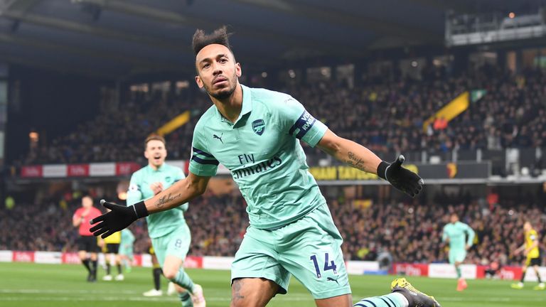 Pierre-Emerick Aubameyang celebrates scoring the only goal of the game at Vicarage Road