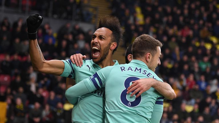 Pierre-Emerick Aubameyang celebrates his goal against Watford with team-mates