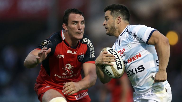 Brice Dulin looks to outstrip Toulouse's number eight Louis Picamoles 