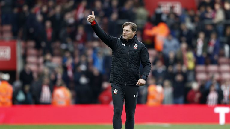 Southampton&#39;s Austrian manager Ralph Hasenhuttl gestures to supporters on the pitch after the English Premier League football match between Southampton and Wolverhampton Wanderers at St Mary&#39;s Stadium in Southampton, southern England on April 13, 2019. 
