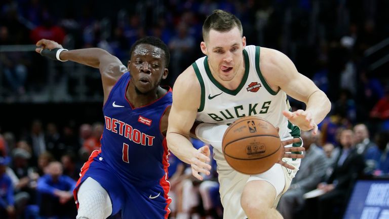  Reggie Jackson #1 of the Detroit Pistons knocks the ball away from Pat Connaughton #24 of the Milwaukee Bucks during the second half of Game Three of the first round of the 2019 NBA Eastern Conference Playoffs at Little Caesars Arena on April 20, 2019 in Detroit, Michigan. T