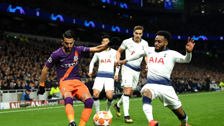 Riyad Mahrez is challenged by Danny Rose during Spurs' Champions League tie with Manchester City