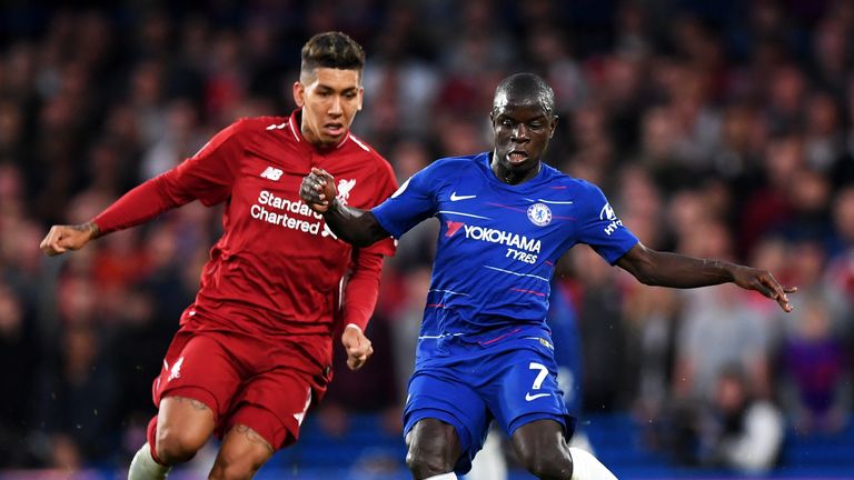 Roberto Firmino of Liverpool and Ngolo Kante of Chelsea during the Premier League match between Chelsea FC and Liverpool FC at Stamford Bridge on September 29, 2018 in London, United Kingdom.