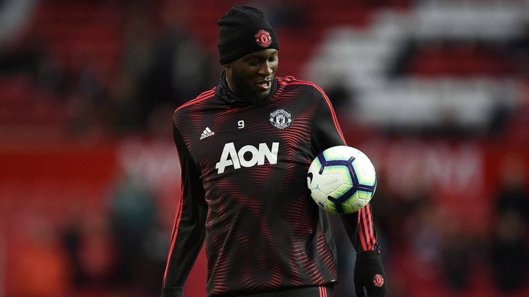 Romelu Lukaku warms up ahead of the Manchester derby