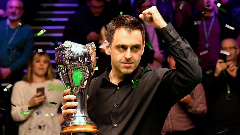 Ronnie O'Sullivan celebrates with the trophy after winning the final of the Betway UK Snooker Championship 2018 at Barbican on December 09, 2018 in York, England.