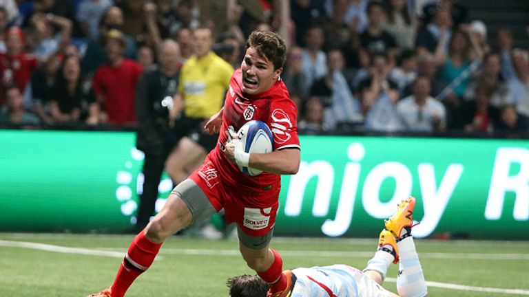 Antoine Dupont scores a try during Toulouse's quarter-final win over Racing 92