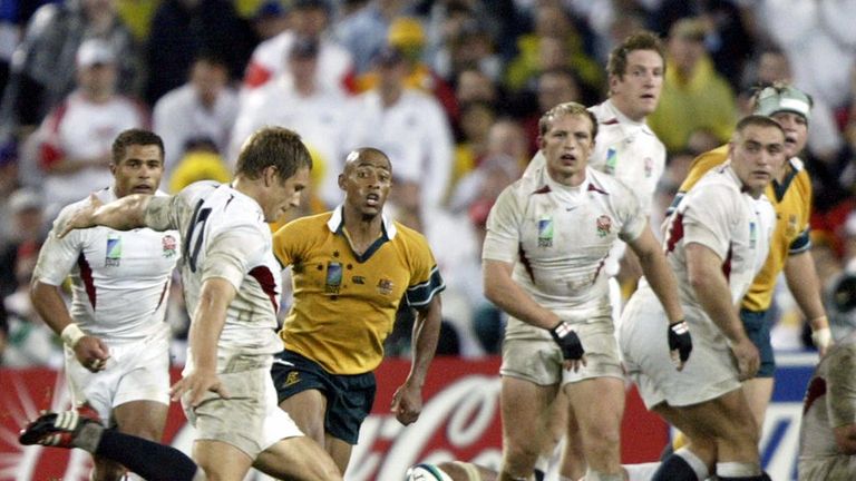 Gregan chases down Johnny Wilkinson's Rugby World Cup-winning drop goal in 2003.