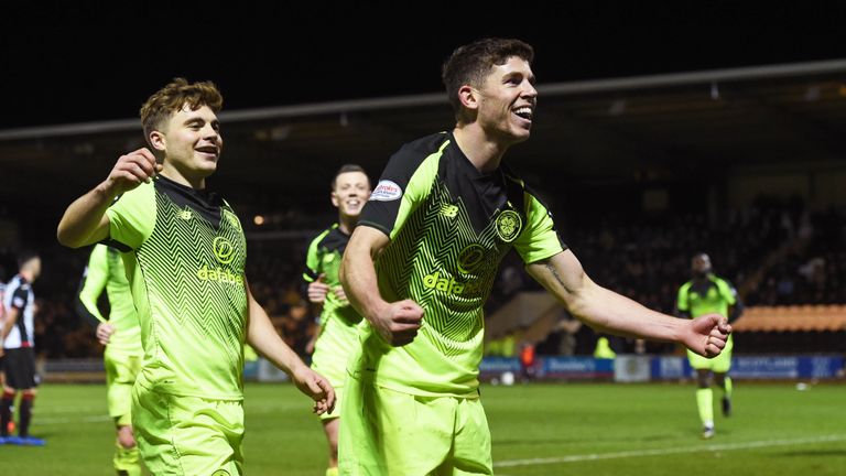 Ryan Christie celebrates with team-mate James Forrest (L) after making it 2-0 to Celtic against St Mirren.