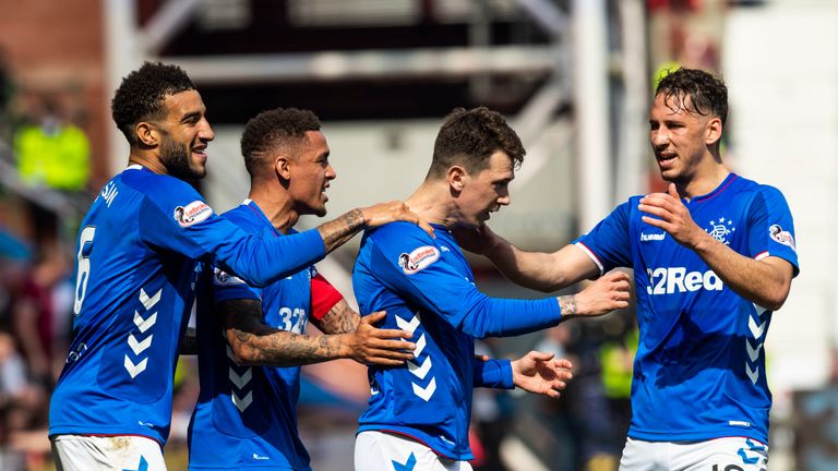 Ryan Jack celebrates with teammates after scoring to make it 2-0