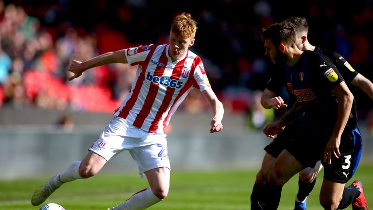 Stoke City's Sam Clucas and Rotherham United's Joe Mattock battle for the ball