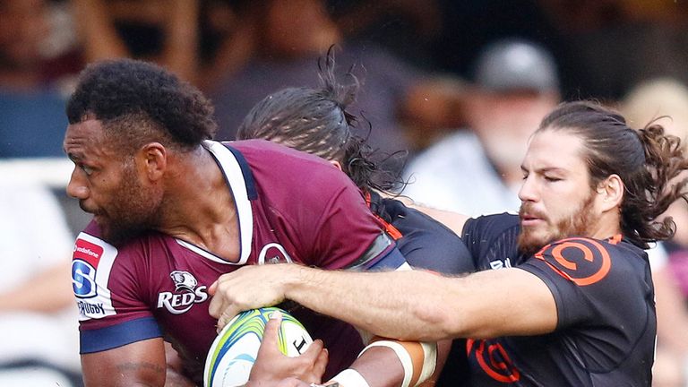 Samu Kerevi is tackled by Kobus van Wyk of the Sharks