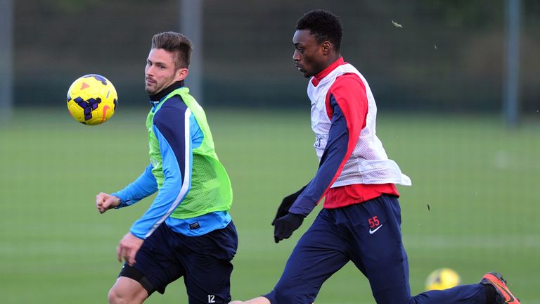 ST ALBANS, ENGLAND - JANUARY 17:  (L-R) Semi Ajayi and Olivier Giroud of Arsenal during a training session at London Colney on January 17, 2014 in St Albans, England.  (Photo by Stuart MacFarlane/Arsenal FC via Getty Images)